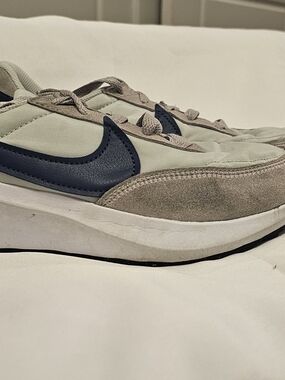 Nike Women’s Cream and Navy Suede-Trim Sneaker